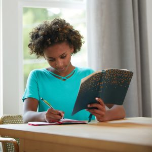 girl reading the bible